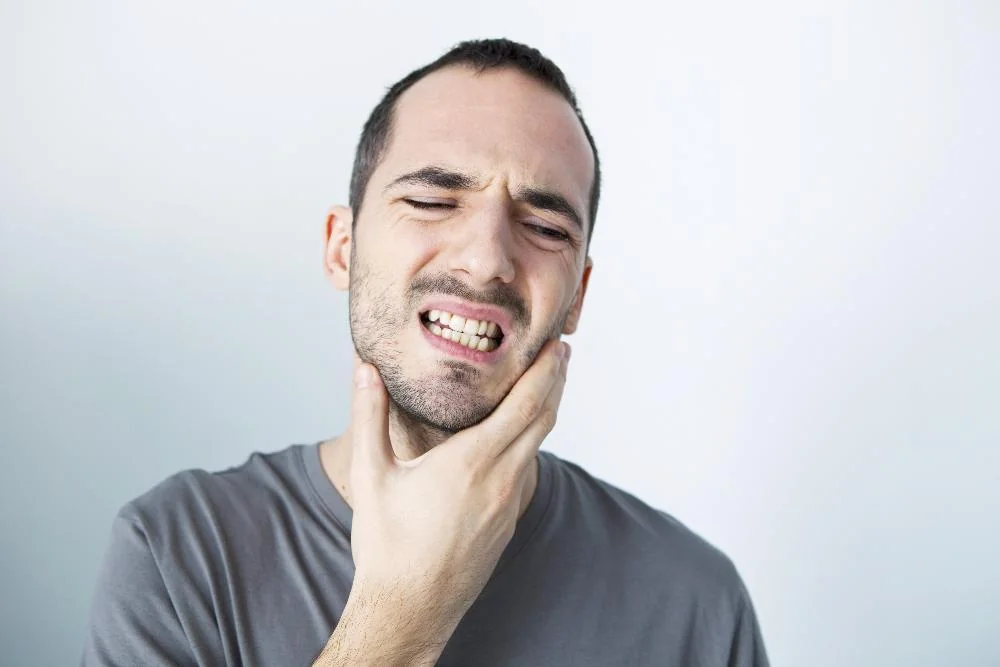 FAQ: Why Does My Tooth Hurt When I Bite Down?